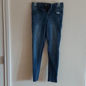 Blue Spice button fly skinny jeans